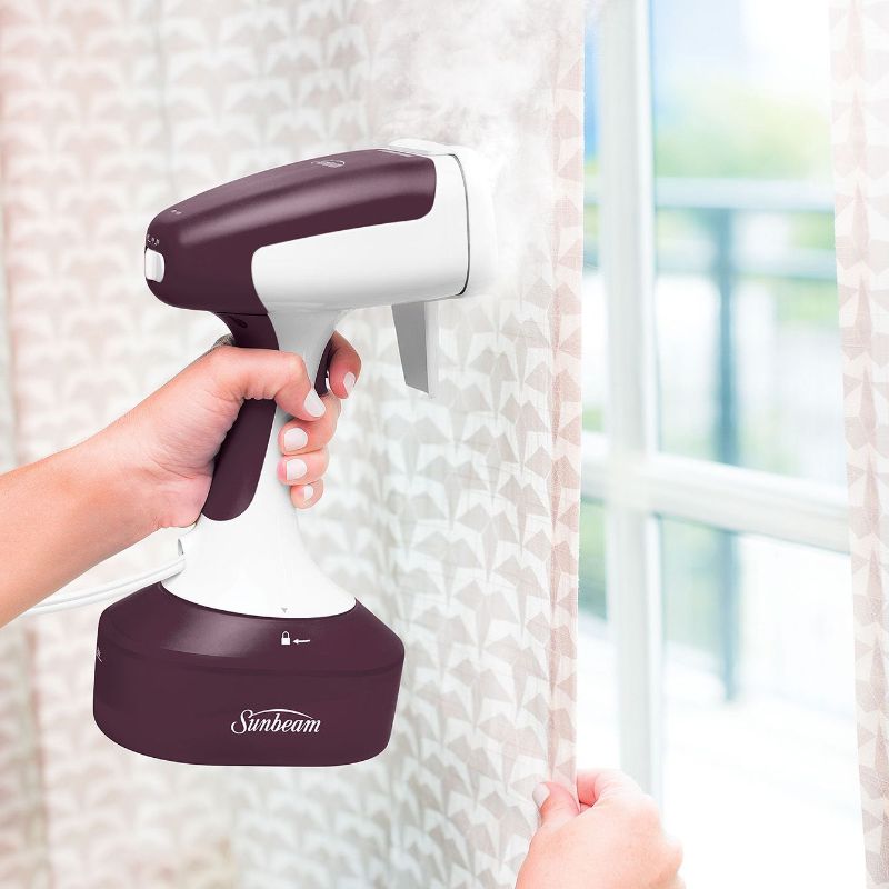 Purple Sunbeam Power Steam Handheld Garment Steamer, 1400 watts, 300ml tank, heats in 40 seconds, includes 4 accessories.