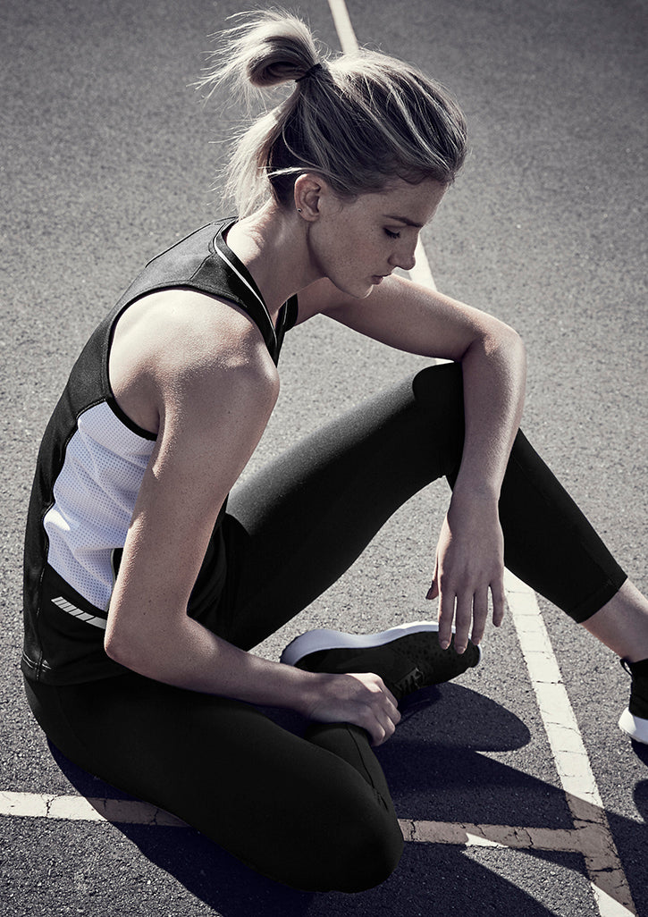 Ladies Renegade Singlet in Black/Red/Silver, Size 18, featuring breathable fabric, mesh panels, and reflective trims for style and comfort.