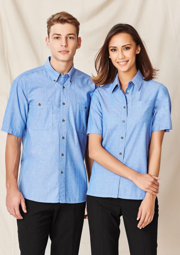 Ladies chambray short sleeve shirt in size 14, featuring a relaxed fit, UPF protection, and elegant tortoise shell buttons.