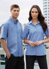 Ladies wrinkle-free chambray short sleeve shirt in size 14, featuring a relaxed fit, chest pocket, and elegant tortoise shell buttons.