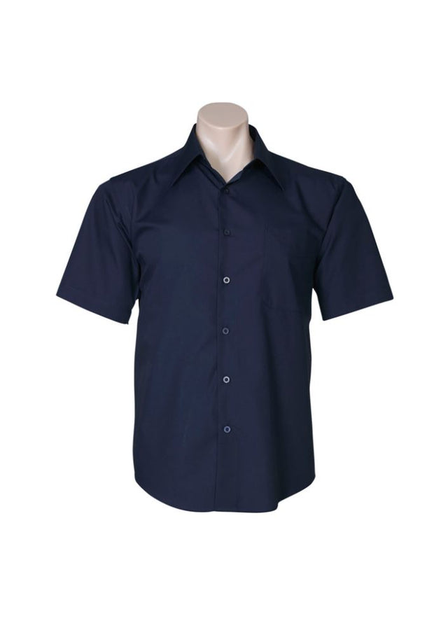 Men's navy short sleeve shirt in 2XL; features tapered fit, curved hem, and UPF protection for style and comfort.