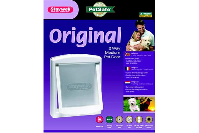 White Staywell Medium Pet Door for dogs, featuring a 2-way entry, closing panel, and optional tunnel extension for easy installation.