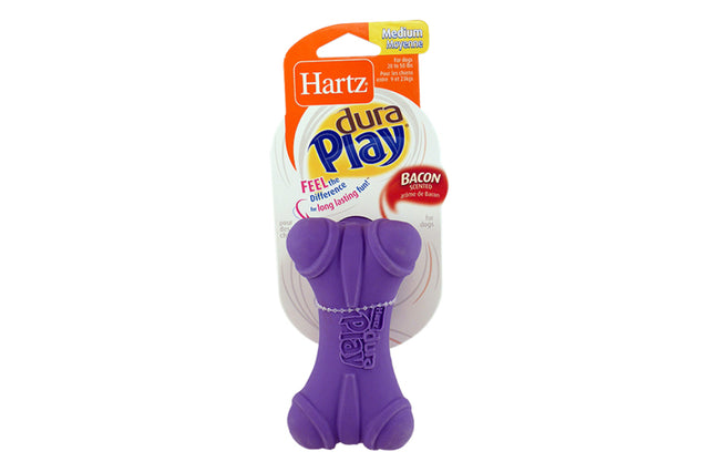 Medium-sized Dura Play Bone dog toy made of squeaky latex and vinyl, designed for durability, playfulness, and water fun.