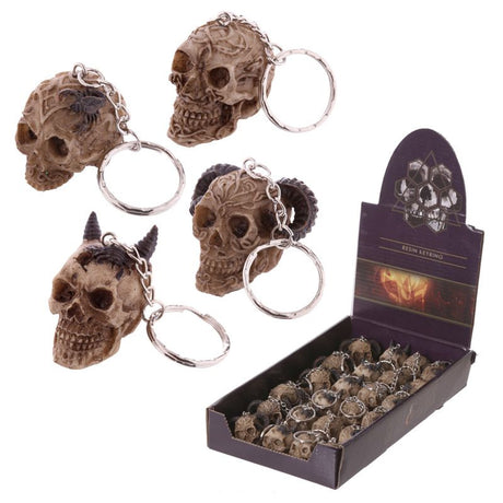A set of 24 skull keychains in 4 assorted designs, perfect for adding a quirky touch to keys or bags.