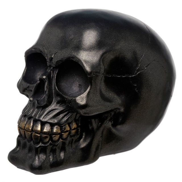 Metallic black skull decoration, 12cm tall, adds gothic elegance and intrigue to home decor or Halloween displays.