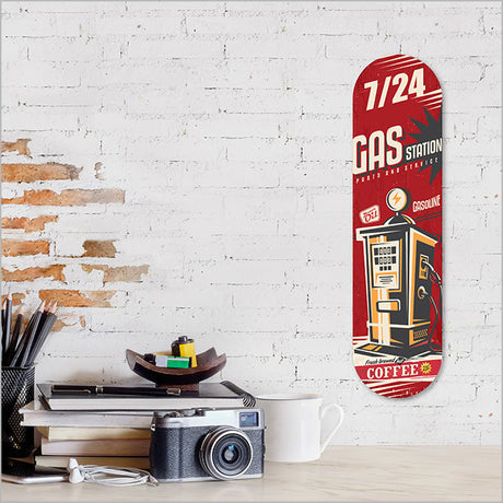 Retro skateboard wall art featuring vibrant gas station imagery, crafted from 4mm ACM, 500mm diameter, ready to hang.