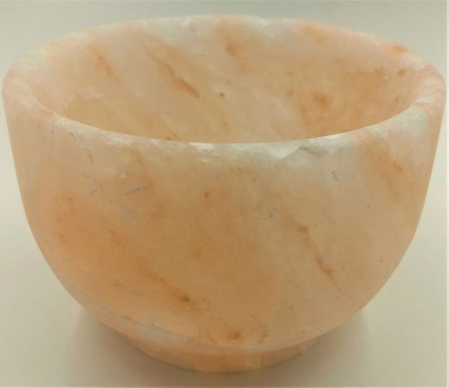 Himalayan salt trinket bowl, 13.5cm diameter, showcasing unique patterns, ideal for decor, snacks, or storing small items.