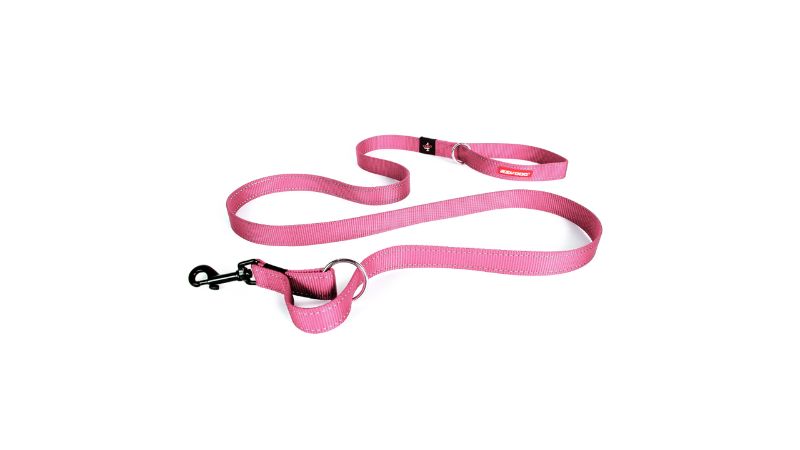 Soft touch pink multifunction dog leash with reflective stitching, adjustable lengths, and emergency tethering feature.