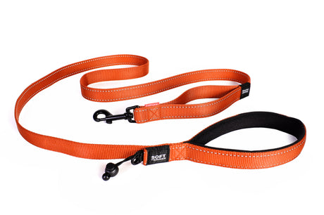 Vibrant orange Ezy Dog Soft Trainer Leash with soft neoprene handle, reflective webbing, and traffic control handle for comfort and control.