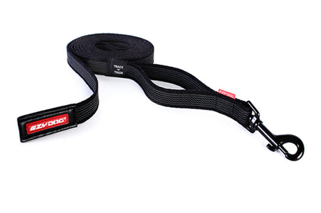 Extra-long black dog training leash with ultra-grippy webbing, traffic control handle, and durable carbon-coated snap clip.