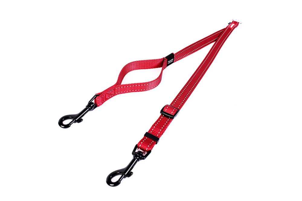 Red EzyDog Soft Touch Coupler, 60cm, features adjustable length, reflective trim, and a Traffic Control Handle for walking two dogs.