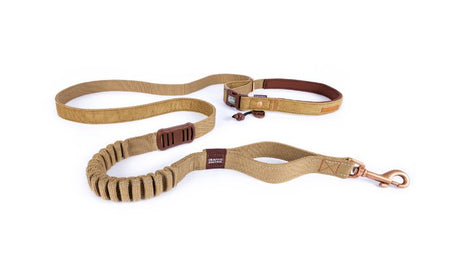 Stylish 2.1m corduroy dog leash with shock-absorbing feature, adjustable length, and reflective trim for safety.