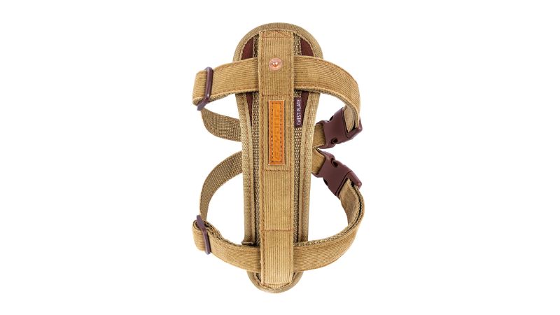 Stylish corduroy dog harness for small breeds, featuring custom EVA fit, easy adjustments, and safety car restraint.