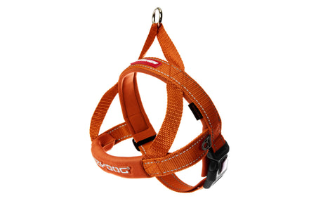 EzyDog Quick Fit Harness in Medium Orange, featuring easy buckle, neoprene comfort, reflective stitching, and secure leash connection.