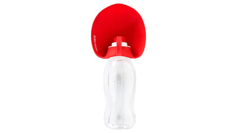 Red EzyDog Dog Leaf Bottle, a portable 600mL water bottle with a silicone trough lid for easy hydration on walks.