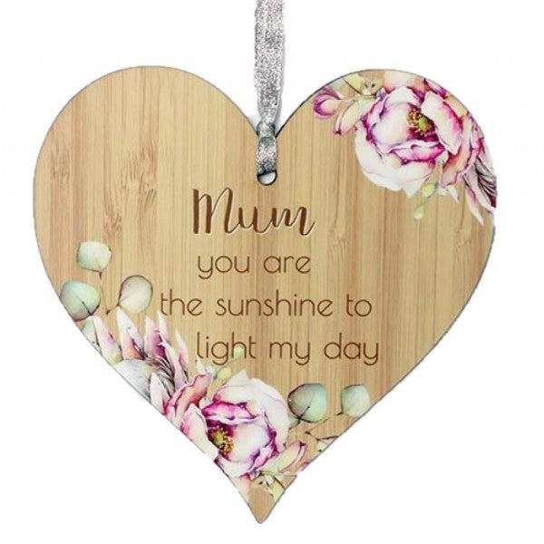 Heart-shaped wooden plaque celebrating motherhood, measuring 15cm, perfect for home decor and meaningful gifts.