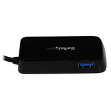 Portable black USB 3.0 hub with 4 ports, offers 5 Gbps speeds, ideal for connecting multiple devices on-the-go.