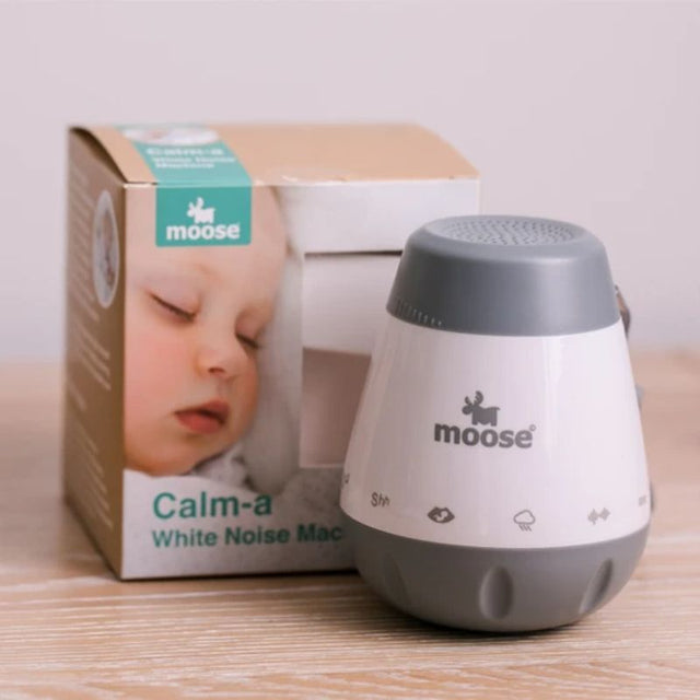 Compact white noise machine for babies with six soothing sounds and cry activation, ideal for peaceful sleep.