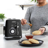 Sleek black Sunbeam Alinea Select toaster for 2 slices, featuring 6 bread options and adjustable browning settings.