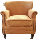 Rustic Mortimer Bigger Leather Armchair in Distressed Camel, featuring top grain leather, solid timber frame, and brass nail detailing.