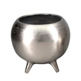 Stylish silver aluminum pot on three legs, perfect for indoor plants and enhancing modern home décor.