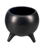 Stylish black aluminum plant pot on three legs, perfect for modern decor and versatile plant display.