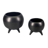 Stylish black aluminium plant pot on three legs, perfect for modern home decor and versatile for small to medium plants.