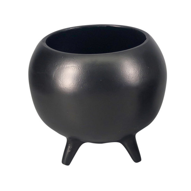 Black aluminium planter on three legs, combining style and stability for indoor/outdoor use, perfect for showcasing plants.