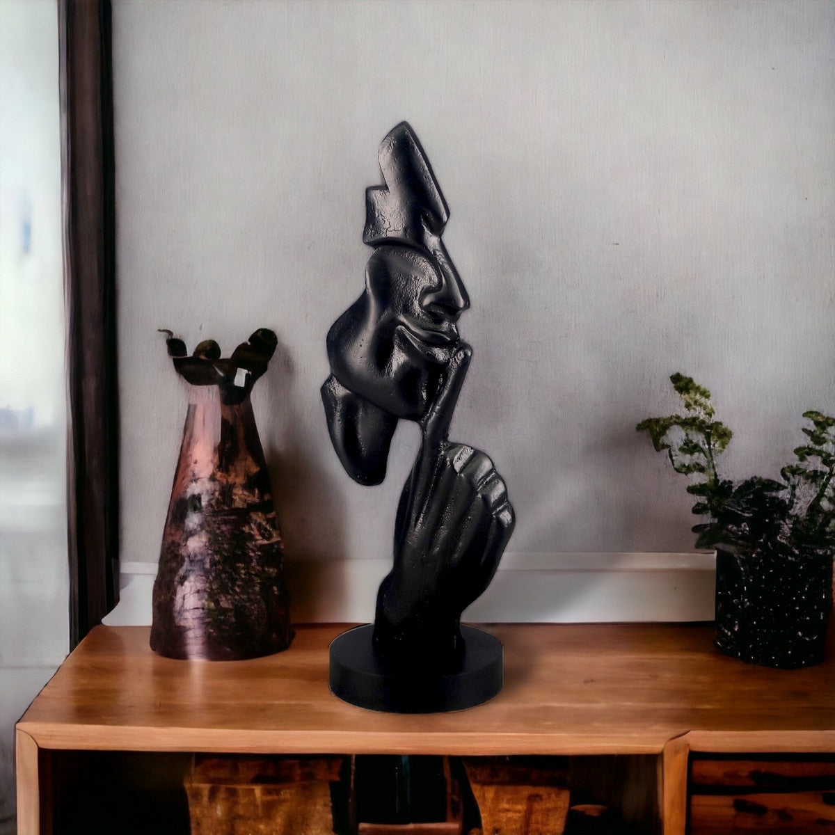 Contemporary black aluminum sculpture on MDF base, showcasing elegance and minimalism for modern decor.