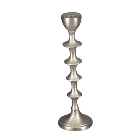 Large tiered candle holder in gleaming silver aluminum, ideal for elegant home decor and creating a cozy atmosphere.