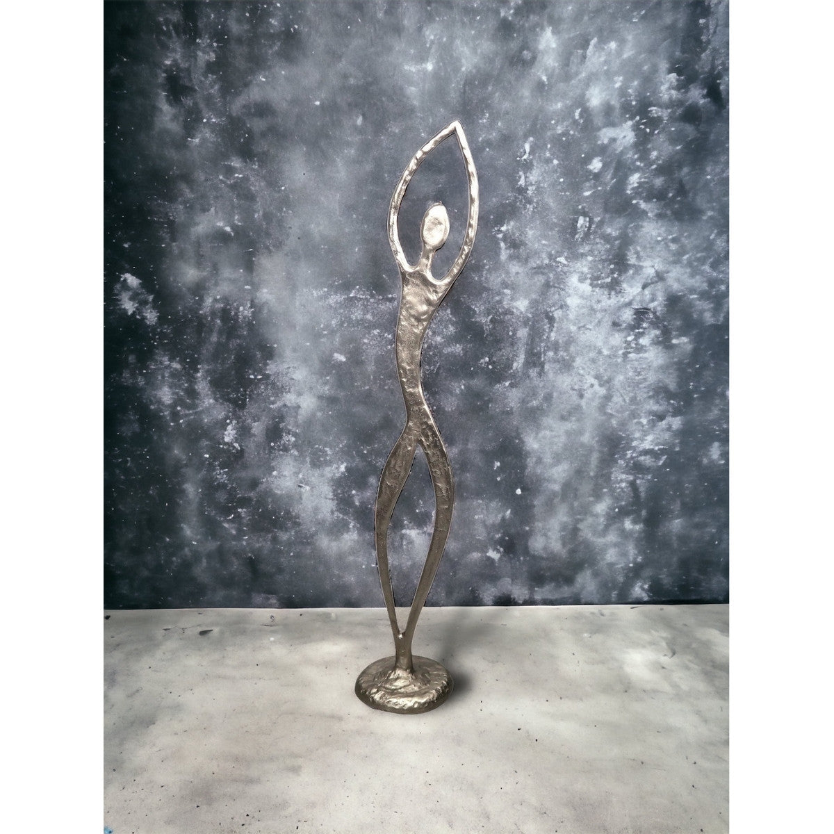 Elegant XL aluminium silver figurine with arms raised, symbolizing positivity and perfect for modern home decor.