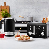 Elegant black 4-slice toaster with electronic browning, defrost, and high lift lever for perfect toasting every time.