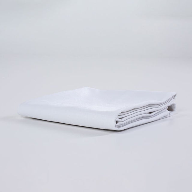 Elegant white Caress tablecloth, 180 x 244cm, durable polyester, stain-resistant, perfect for events and dining decor.