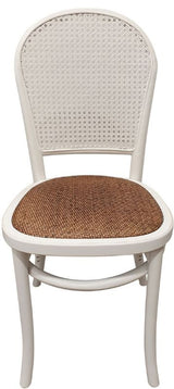 Elegant white oak dining chair with rattan back, perfect for stylish and comfortable dining experiences.