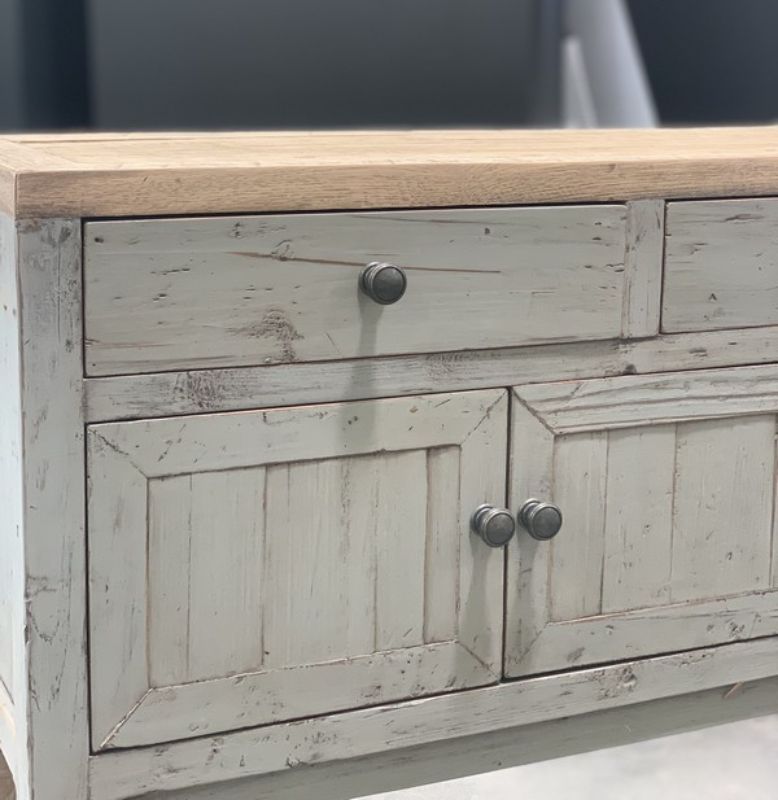 A stylish grey console with natural oak top, featuring 3 drawers and 4 doors for ample storage, ideal for any living space.