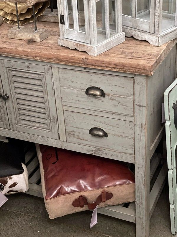 Elegant grey console with natural oak top, featuring 3 drawers and 4 doors for stylish storage and display.