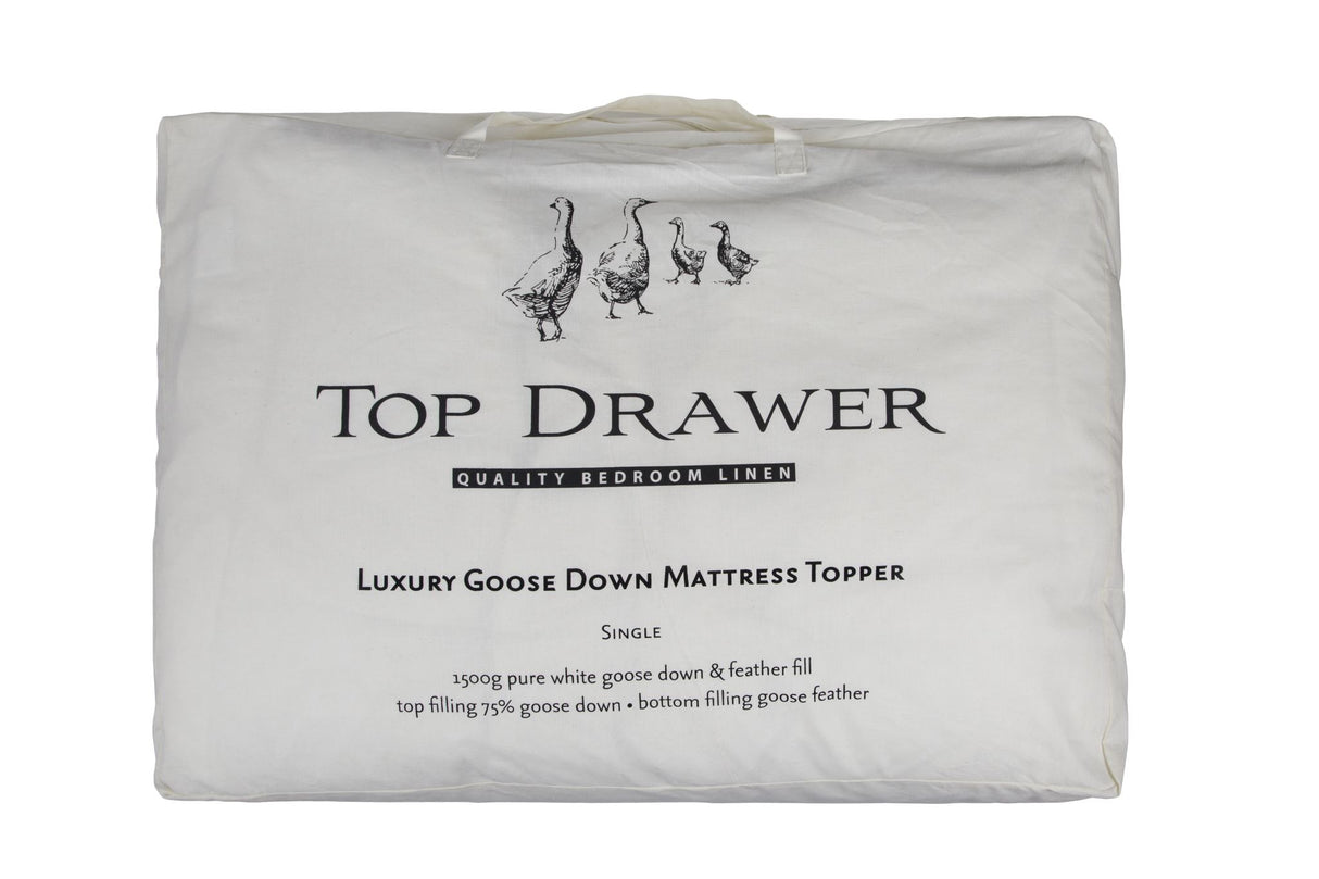 Luxurious king mattress topper with 75% goose down and 25% feather fill for ultimate comfort and support.