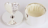 Elegant crystal heart trinket box on silver base, perfect for jewelry storage and decorative display.