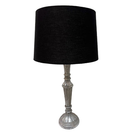 Elegant table lamp with wood silver leaf finish and black linen shade, perfect for modern and traditional decor.