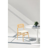 Elegant Boston Elm dining chair with natural Boucle fabric and rattan accents, perfect for enhancing any dining space.