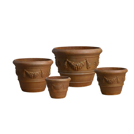 Set of 4 Corinthian round planters in rusty terracotta, ideal for enhancing outdoor spaces with style and elegance.