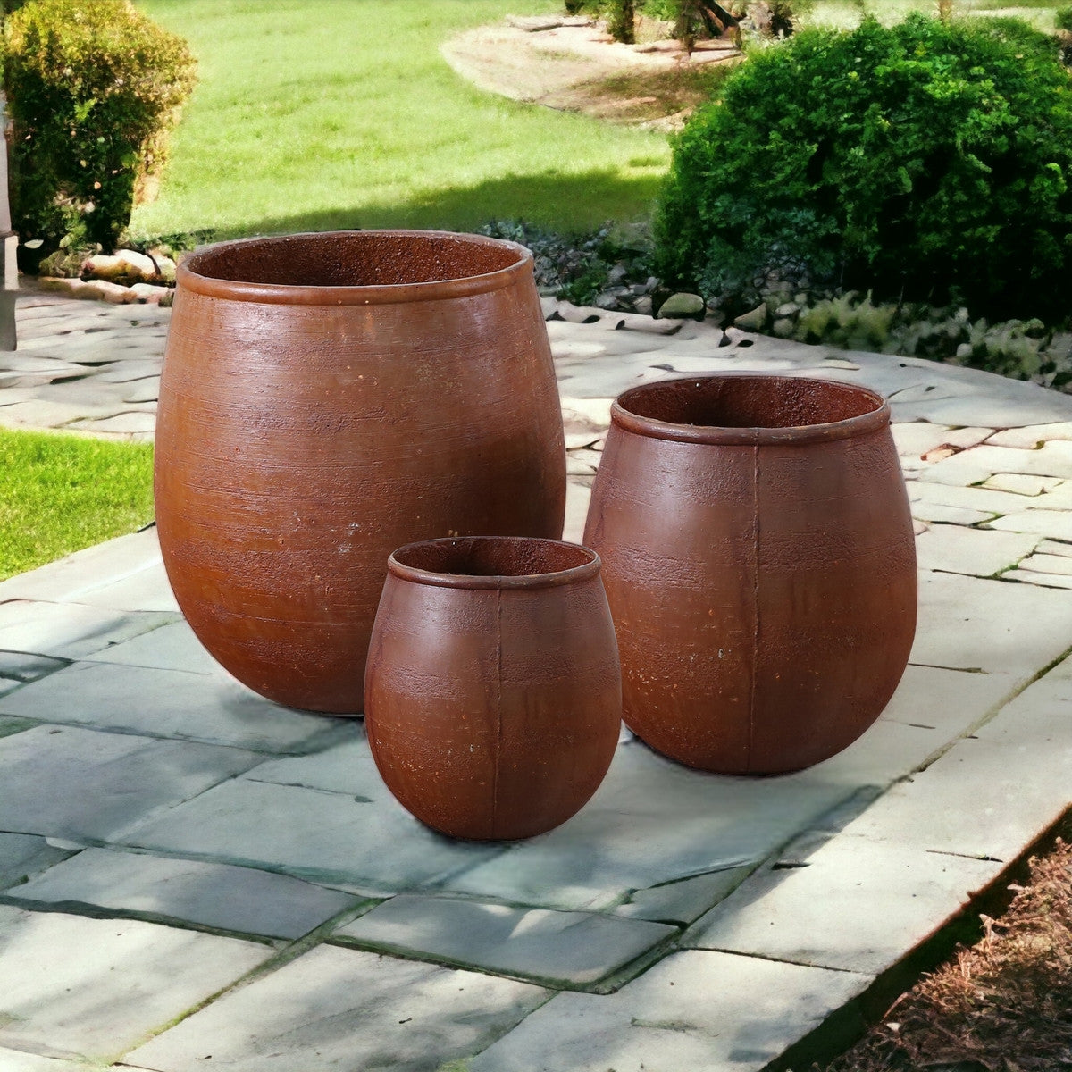 Set of 3 Pompeii Round Planters in rusty terracotta, perfect for adding rustic charm to any outdoor space.