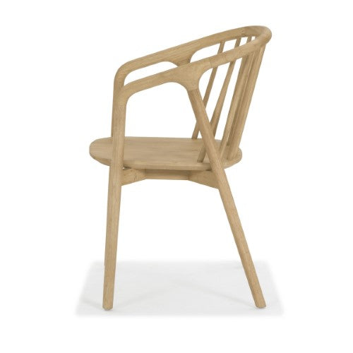 Elegant Nordic dining chair with arms, made of natural rubberwood; features clean lines and exceptional comfort.