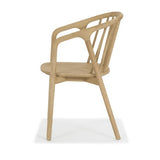 Elegant Nordic dining chair with arms, made of natural rubberwood; features clean lines and exceptional comfort.