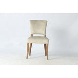 Luxurious Eskimo Velvet dining chair with silver studs and solid ash wood frame for elegant comfort and style.