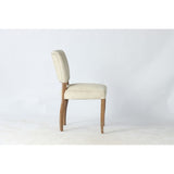 Plush Eskimo Velvet dining chair in white with silver studs and sturdy ash wood frame, combining elegance and comfort.