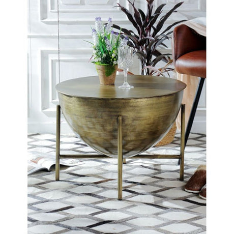 Elegant brass coffee table (60cm) adds modern flair and functionality, perfect for small living spaces and showcasing decor.