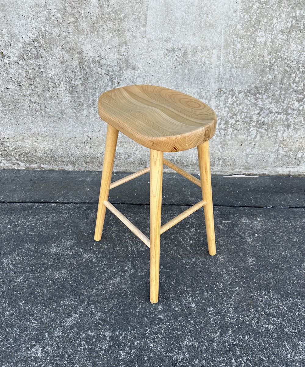 Natural Tractor Stool (65cm) crafted from durable Toon wood, featuring a rustic design perfect for kitchens or workshops.