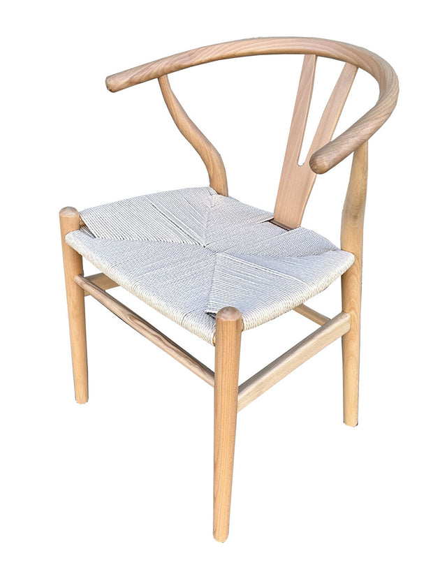 Natural and white Wishbone Chair featuring a rattan seat and beech wood frame, ideal for modern and stylish interiors.