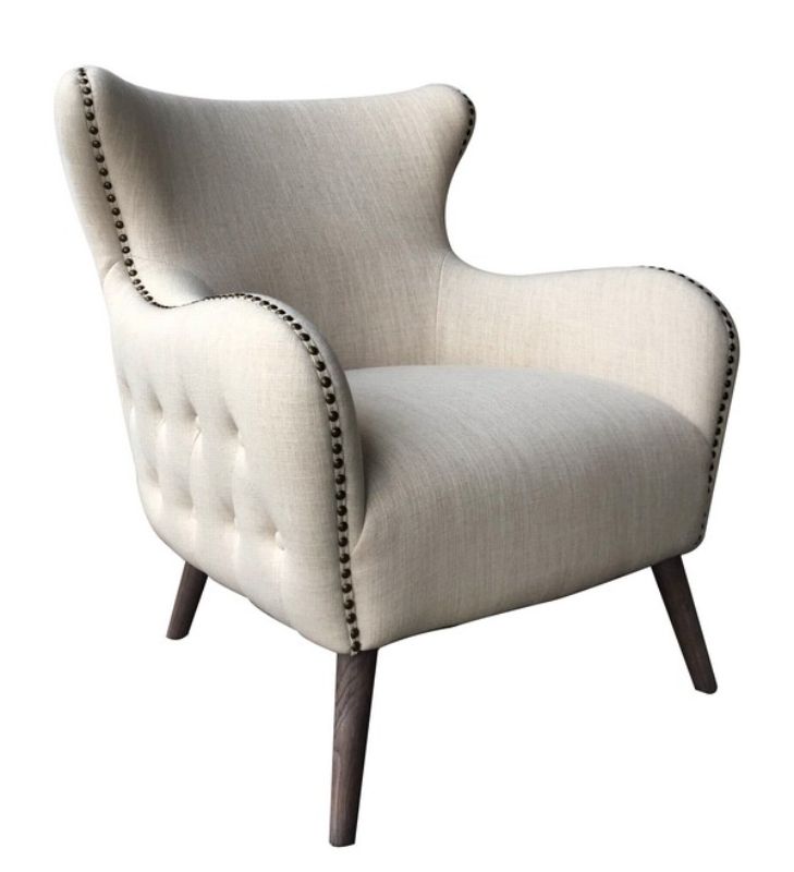 Elegant Sahara occasional chair in linen fabric, featuring button backing and brass nail detailing, perfect for any decor.